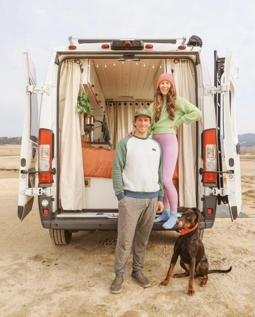 man and woman in campervan: Court and Nate